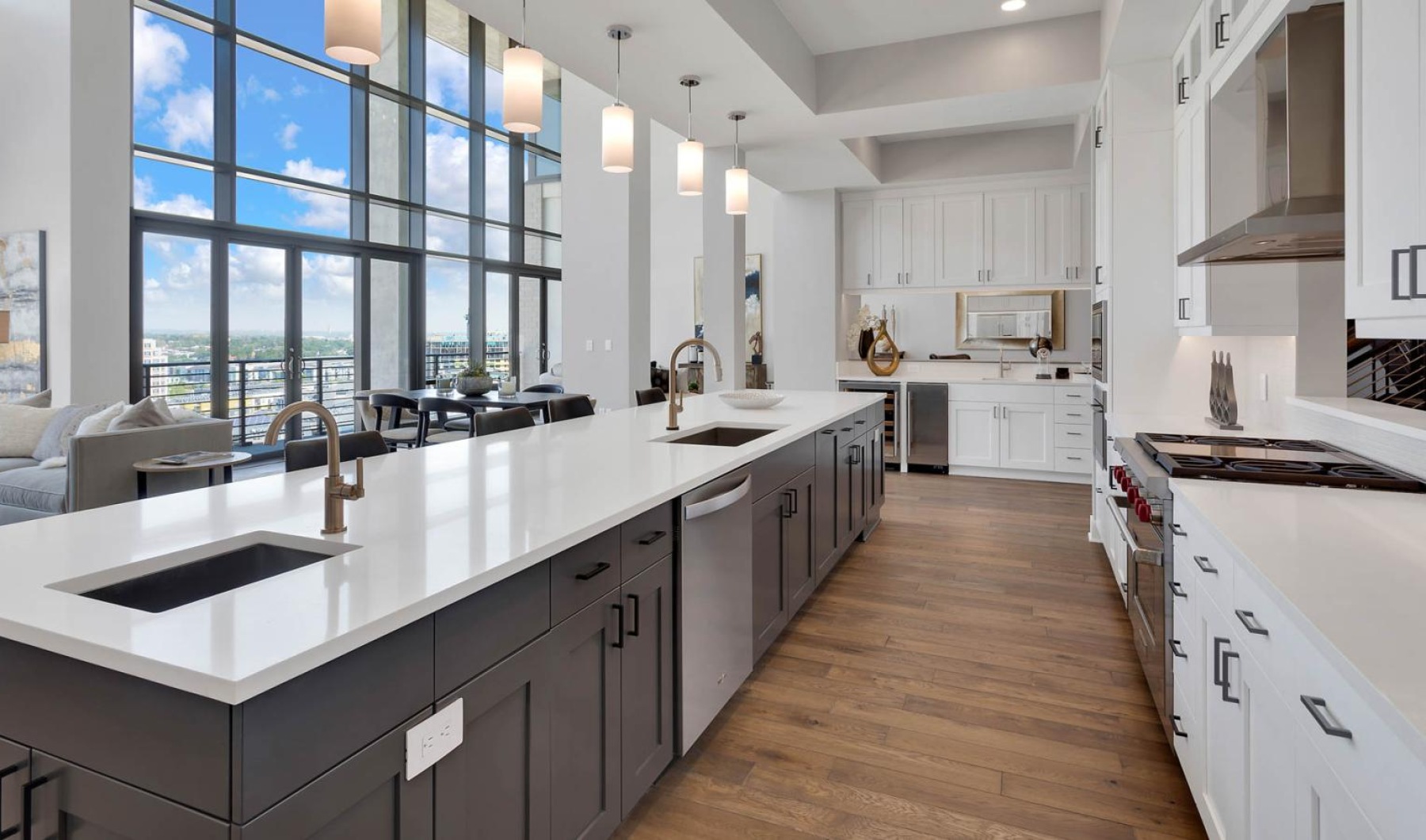 a kitchen with a large window at The Pullman Apartments in Denver, CO near Union Station