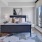 a bedroom with a large window at The Pullman Apartments in Denver, CO near Union Station